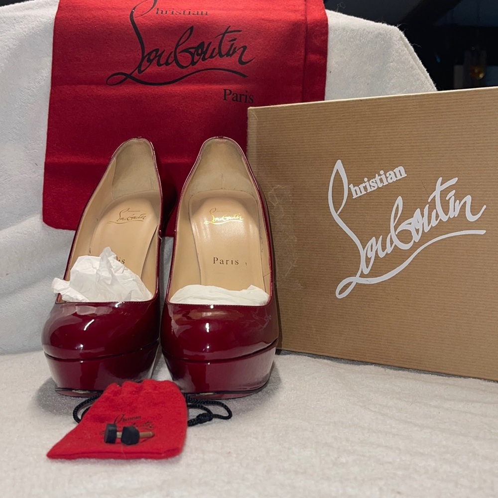 Christian Lounoutin Red beautiful stilettos.